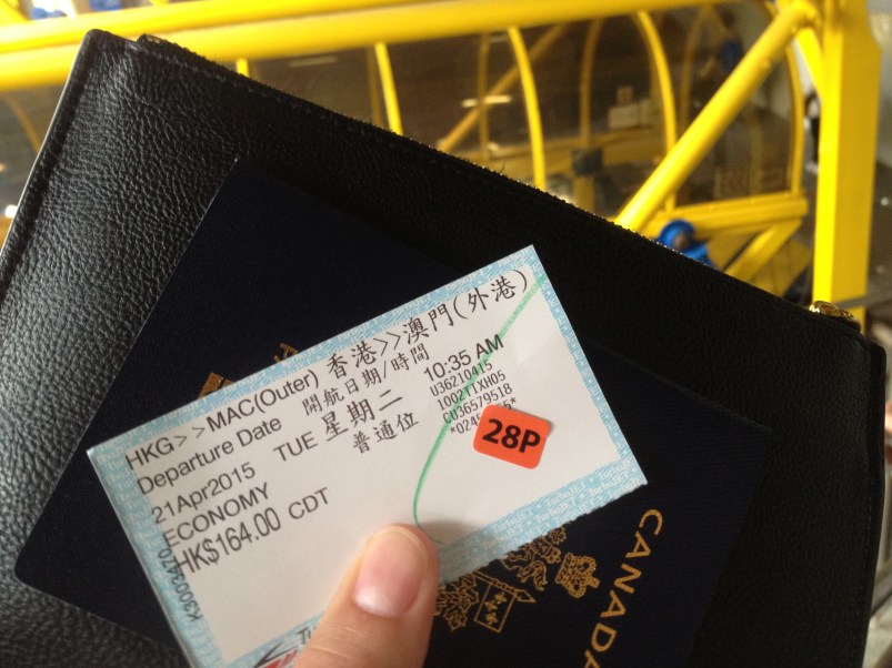 I'm ready to board the ferry, armed with my ticket, passport, and Work Visa stamp. 