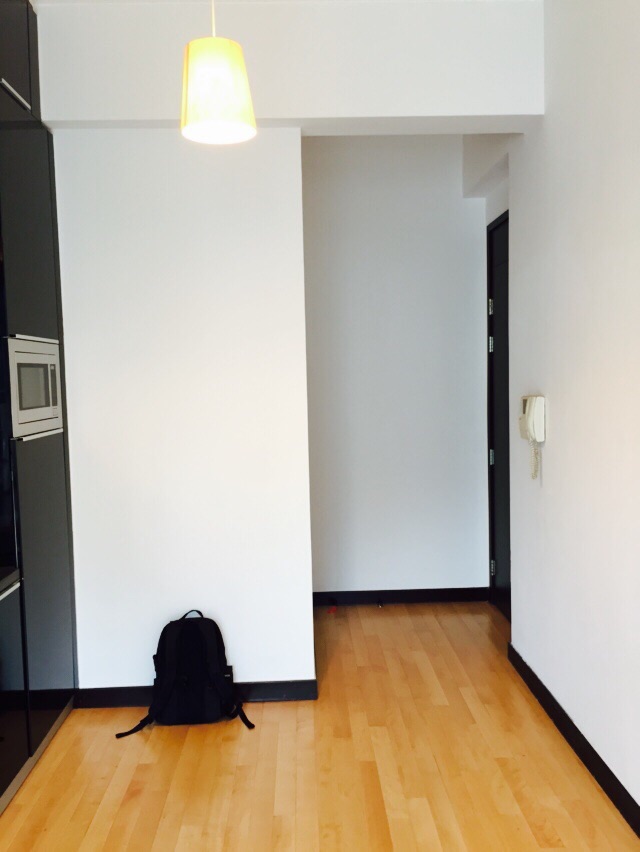 The entry door is on the right side of this photo.  From there you walk right in to the kitchen / living area.  