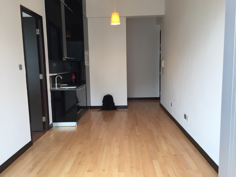 View from the balcony end of the living area back toward the kitchen.  