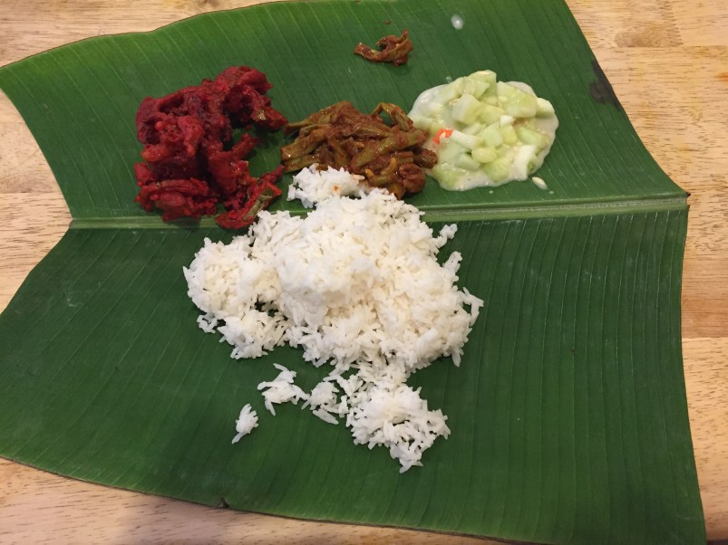 In addition to what we ordered they served us rice with our choice of sauce, something deep fried (like a zucchini?) spicy beans and cucumber salad.